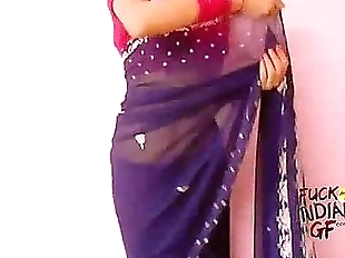 young indian wife teaching how to wear saree - 1..